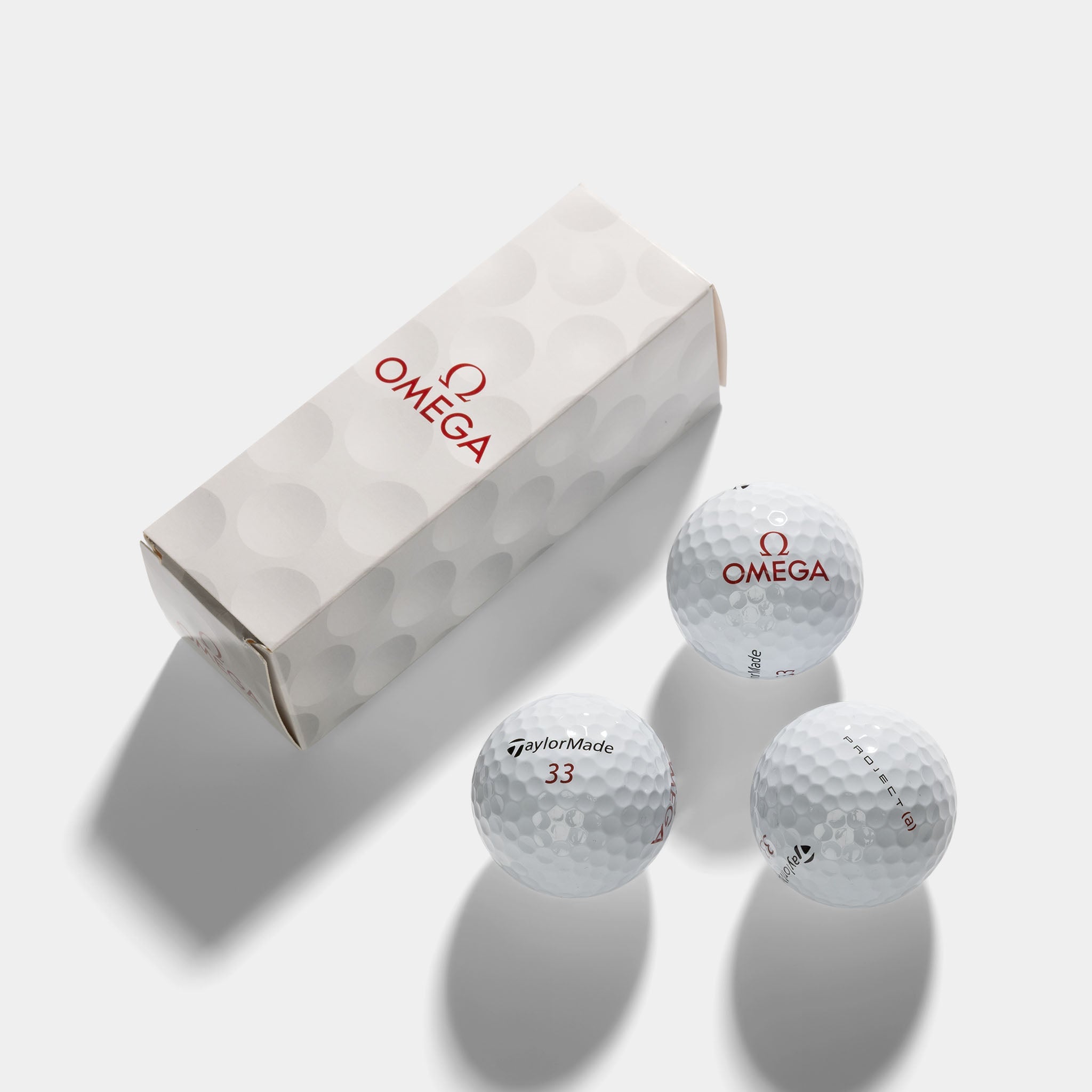Omega set of three collectable golfballs