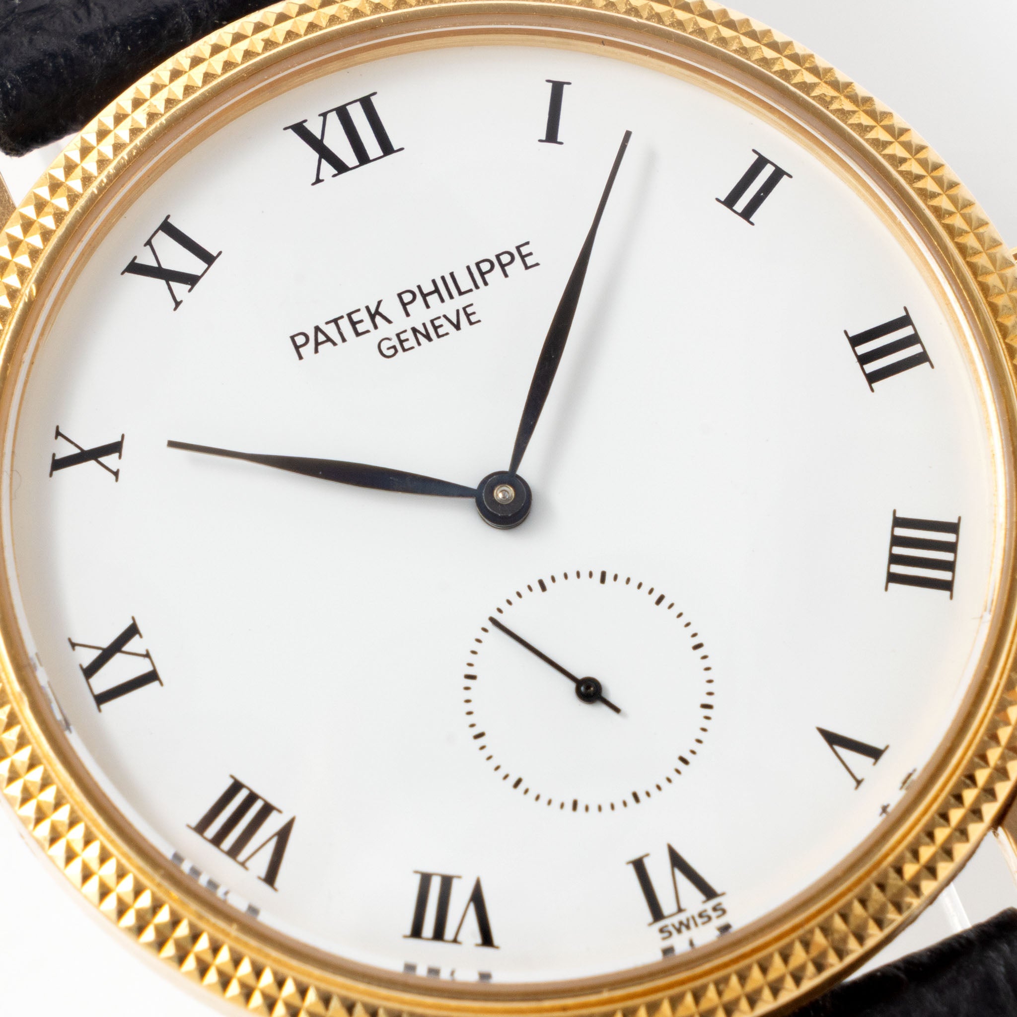 Patek Calatrava Porcelain dial , Clous de Paris 18k yellow gold case with extract from the archives ref 3919