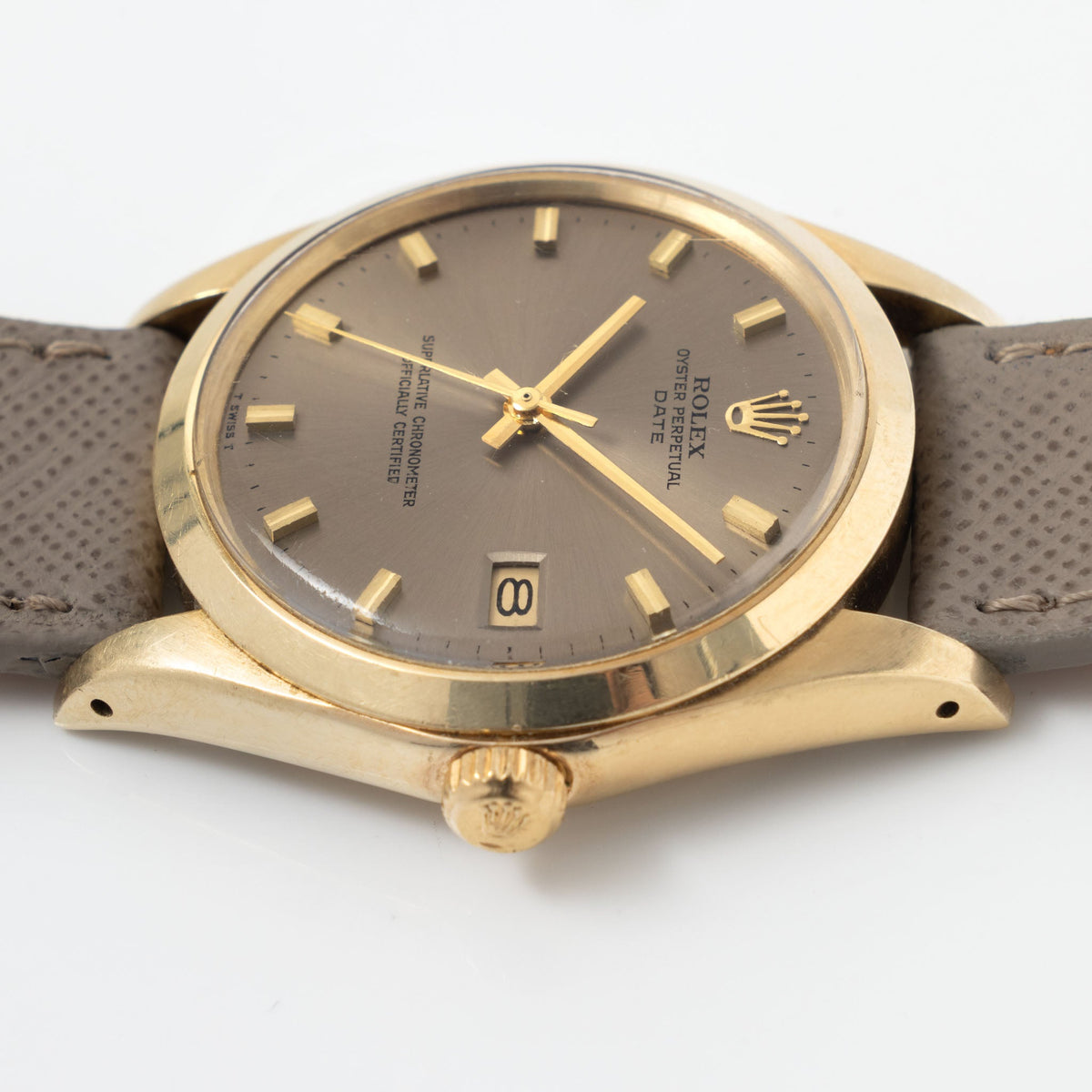 Rolex Date Grey Singer “test dial “ in 14 k Yellow Gold ref 1500