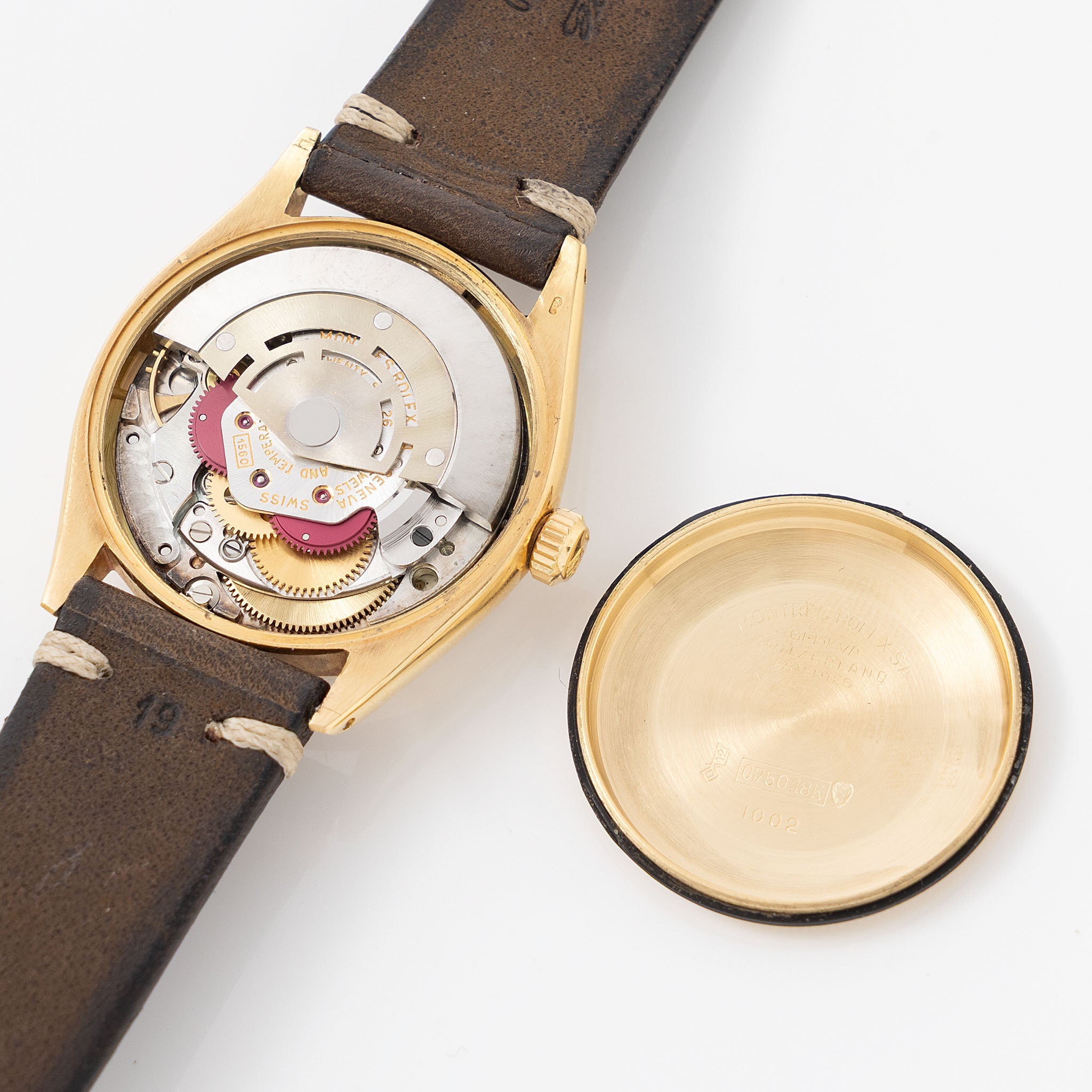 Rolex Oyster Perpetual 1002 Silver Soleil Swiss Only Dial in 18 k yellow gold Coca Cola