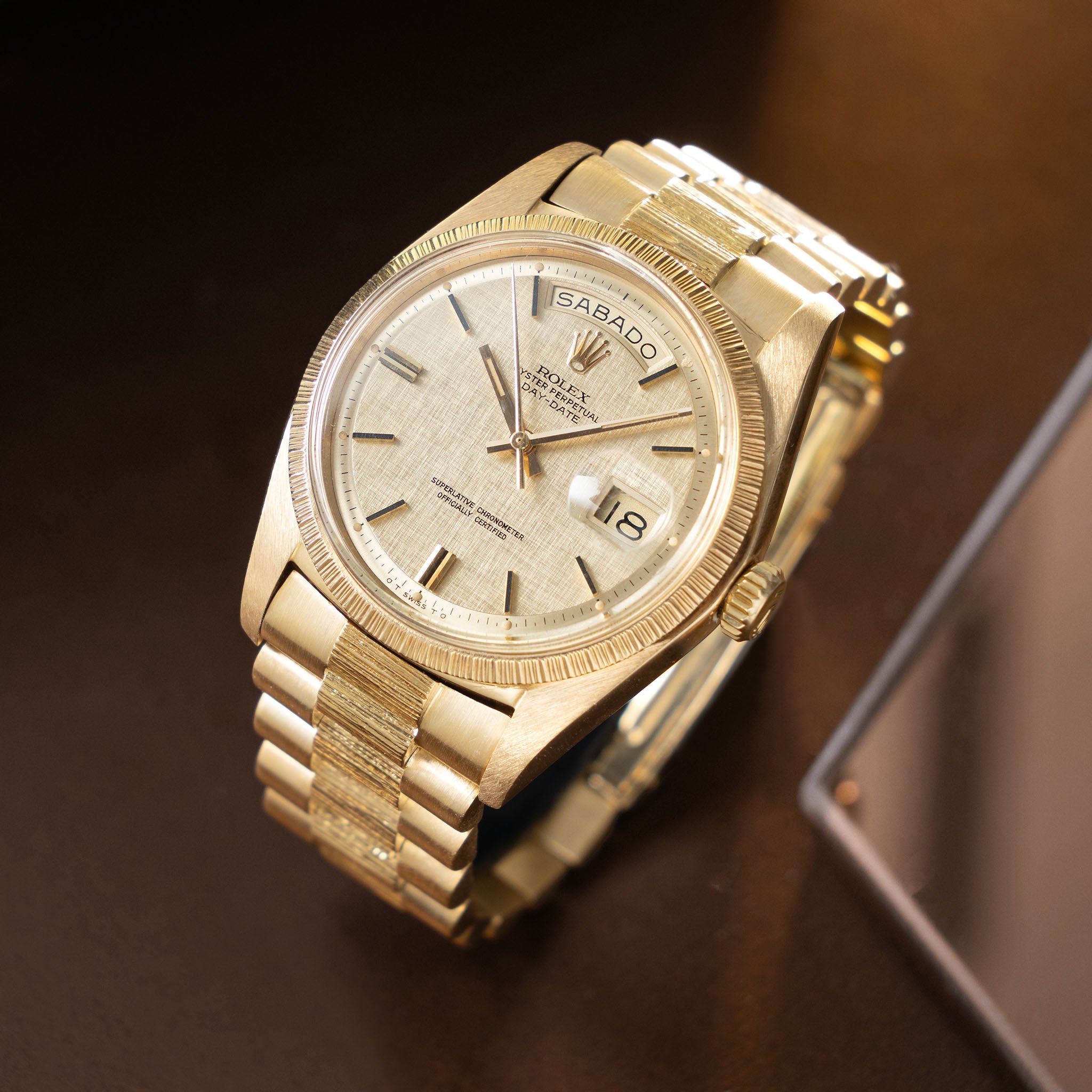 Rolex Day-Date 1807 Linen Sigma Dial Bark Finish in 18k Yellow Gold