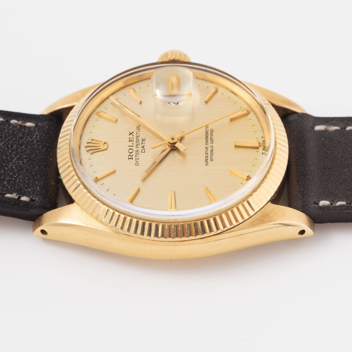 Rolex Oyster Perpetual Date 1503 in 18k Yellow Gold Vertical Brushed Champagne Dial