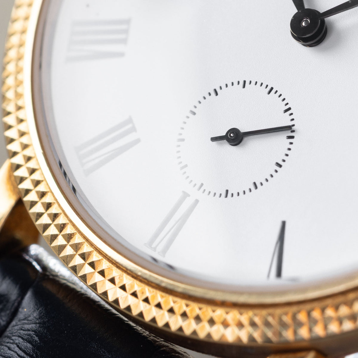 Patek Philippe Calatrava Ref 7119J 18k Yellow Gold Clous de Paris with White Roman Dial