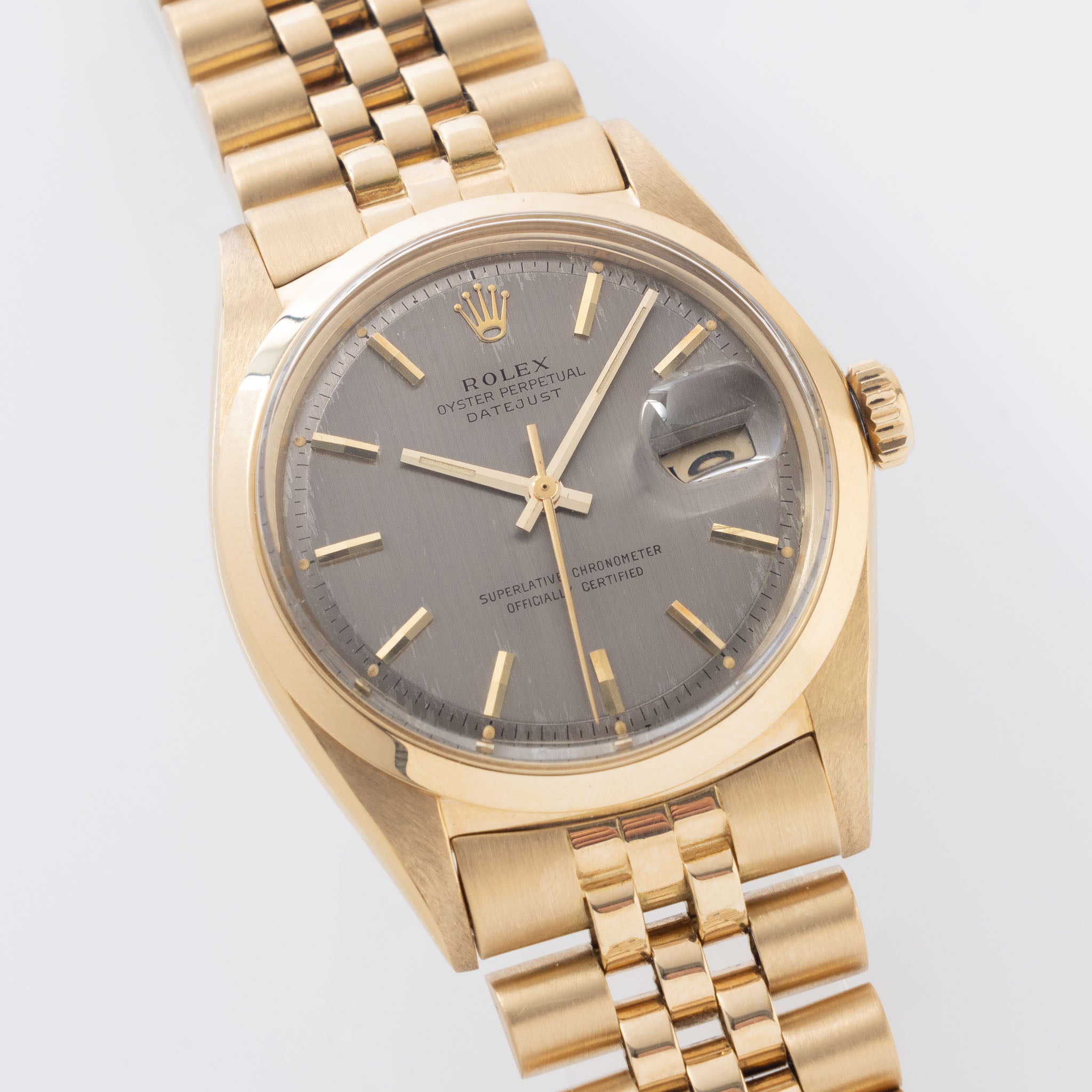 Rolex Datejust Grey vertical brushed dial in 18 k yellow gold ref 1600