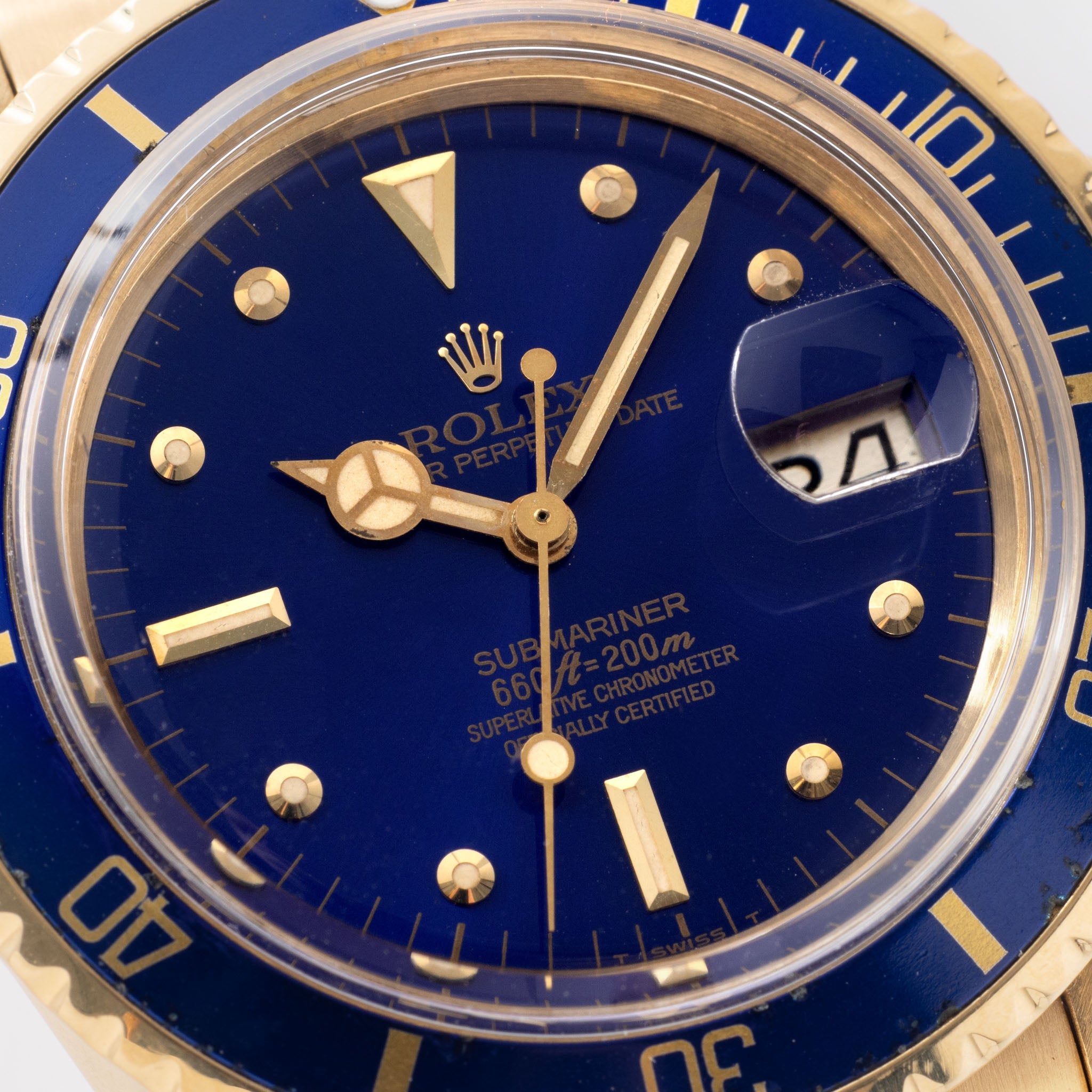 Rolex Submariner 1680/8 in 18k Yellow Gold with Blue "Nipple" Dial Turned Purple