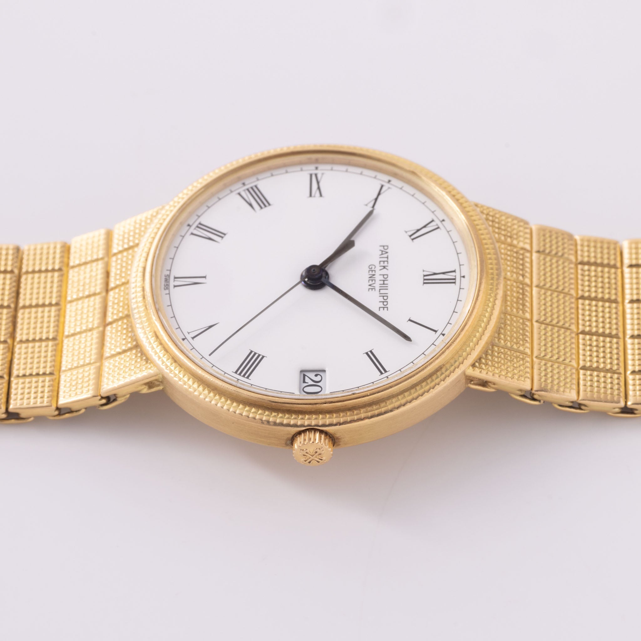 Patek Philippe Calatrava Automatic White Dial in 18k Yellow Gold Ref. 3802J with Integrated Bracelet