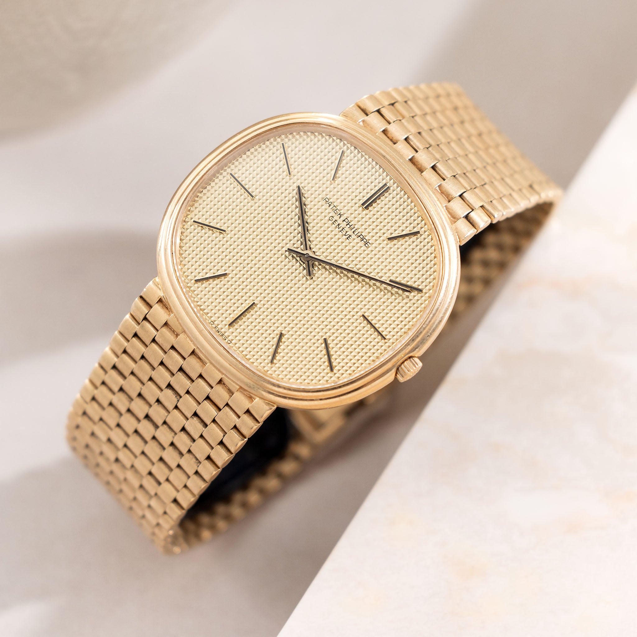 Patek Ellipse Golden Ellipse Hobnail Dial "Jumbo TV case" in 18K Yellow Gold and Rare Integrated Brick Bracelet Ref. 3739/2