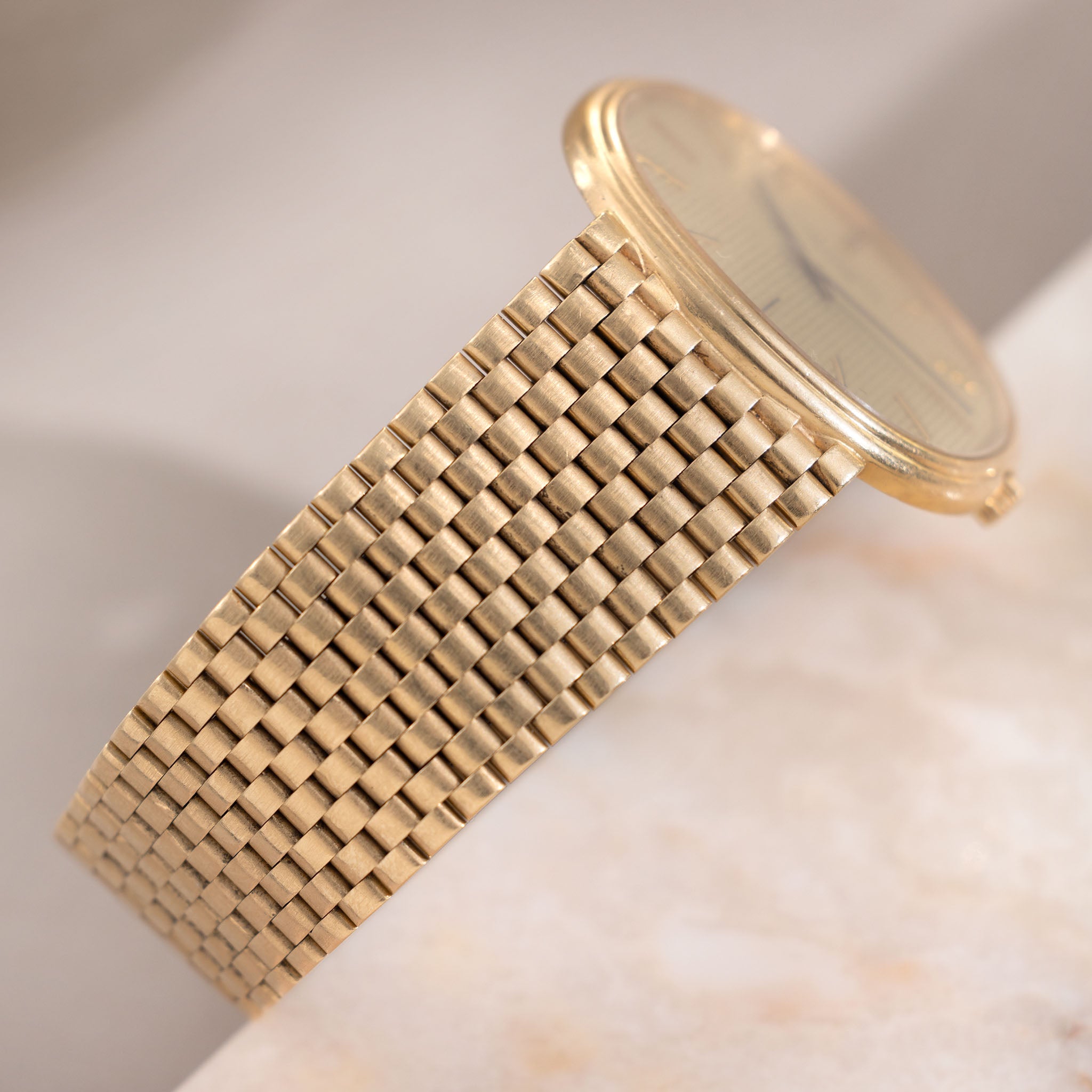 Patek Ellipse Golden Ellipse Hobnail Dial "Jumbo TV case" in 18K Yellow Gold and Rare Integrated Brick Bracelet Ref. 3739/2