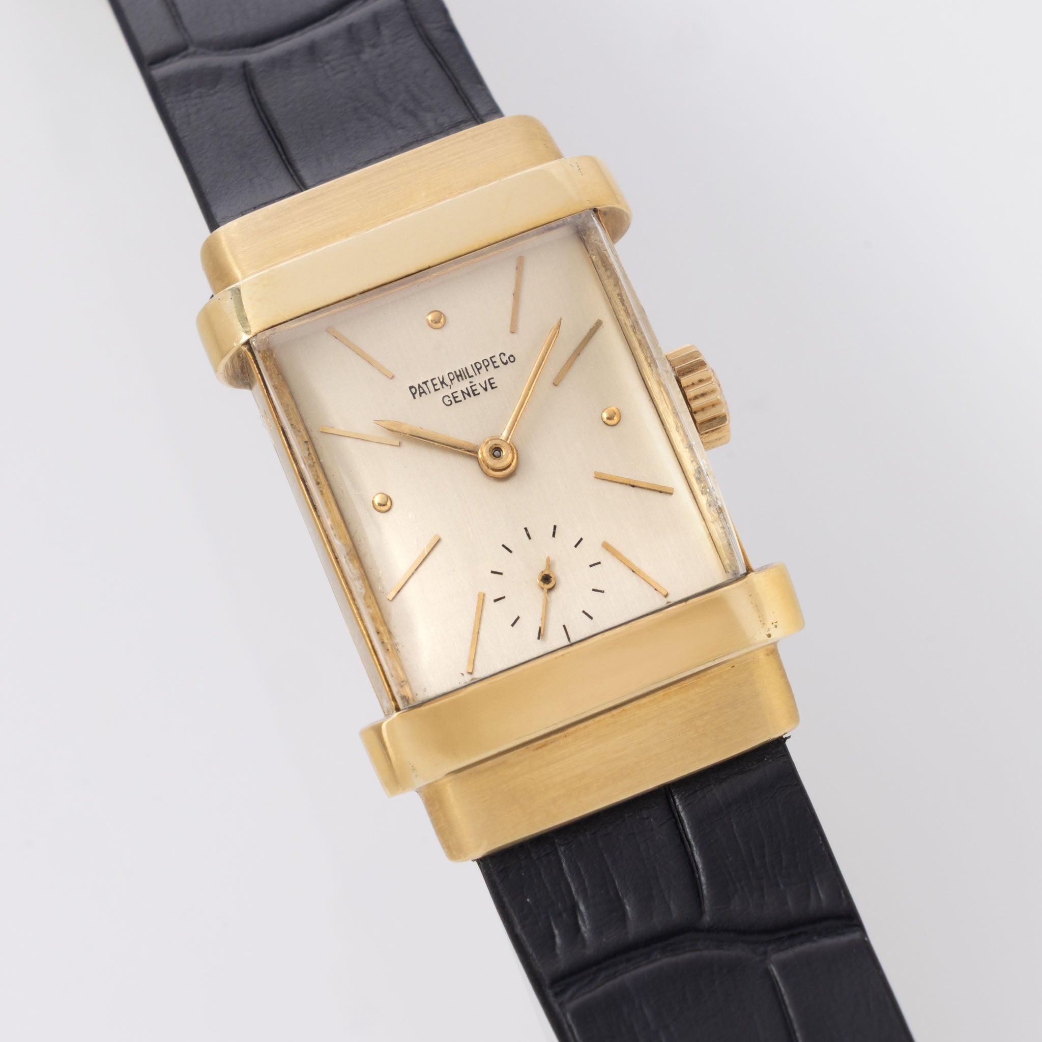 Patek Philippe Top Hat Dresswatch in 18k yellow gold ref. 1450 silver dial