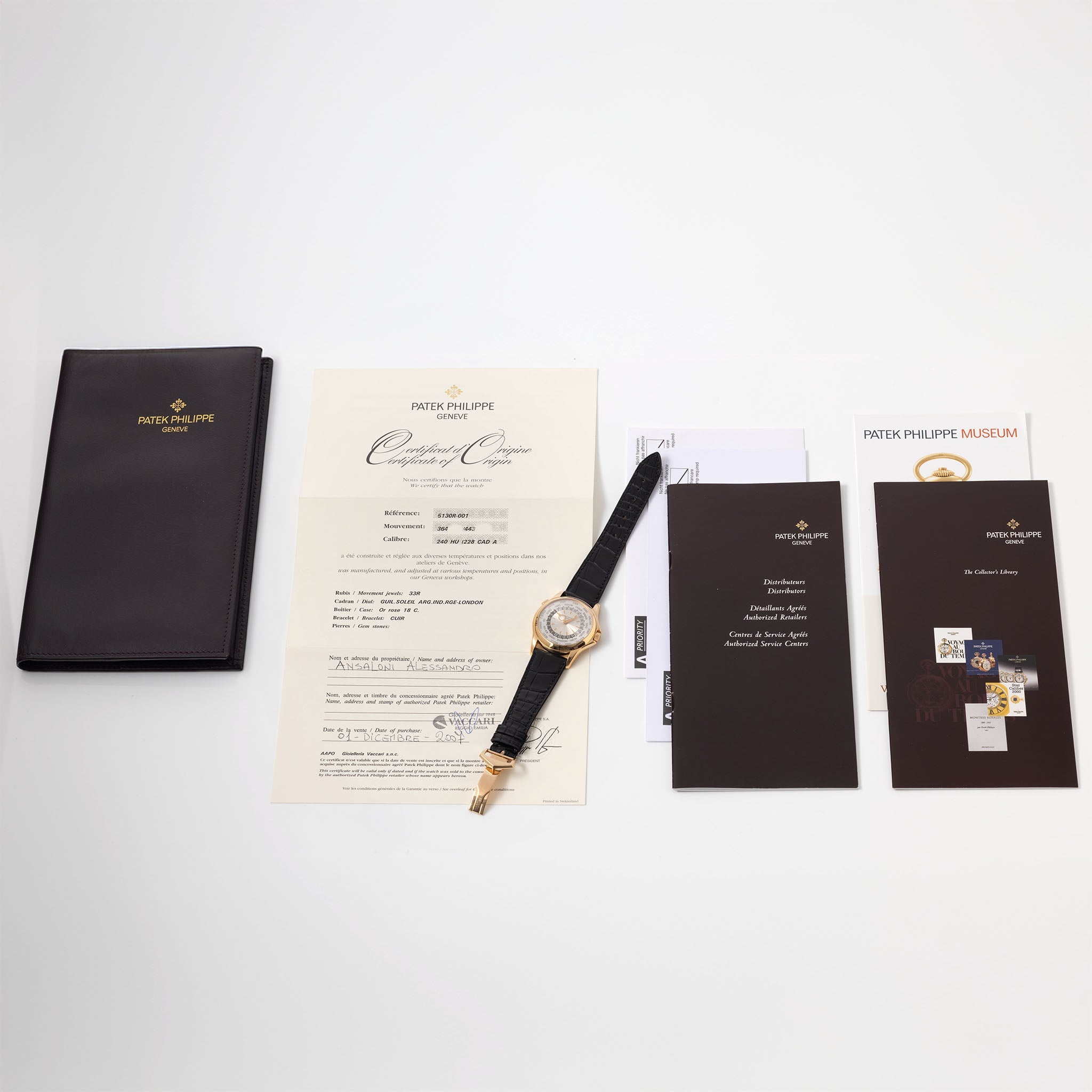 Patek Philippe World Time ref 5130R Guilloché Dial in 18k Rose Gold with Box and Papers