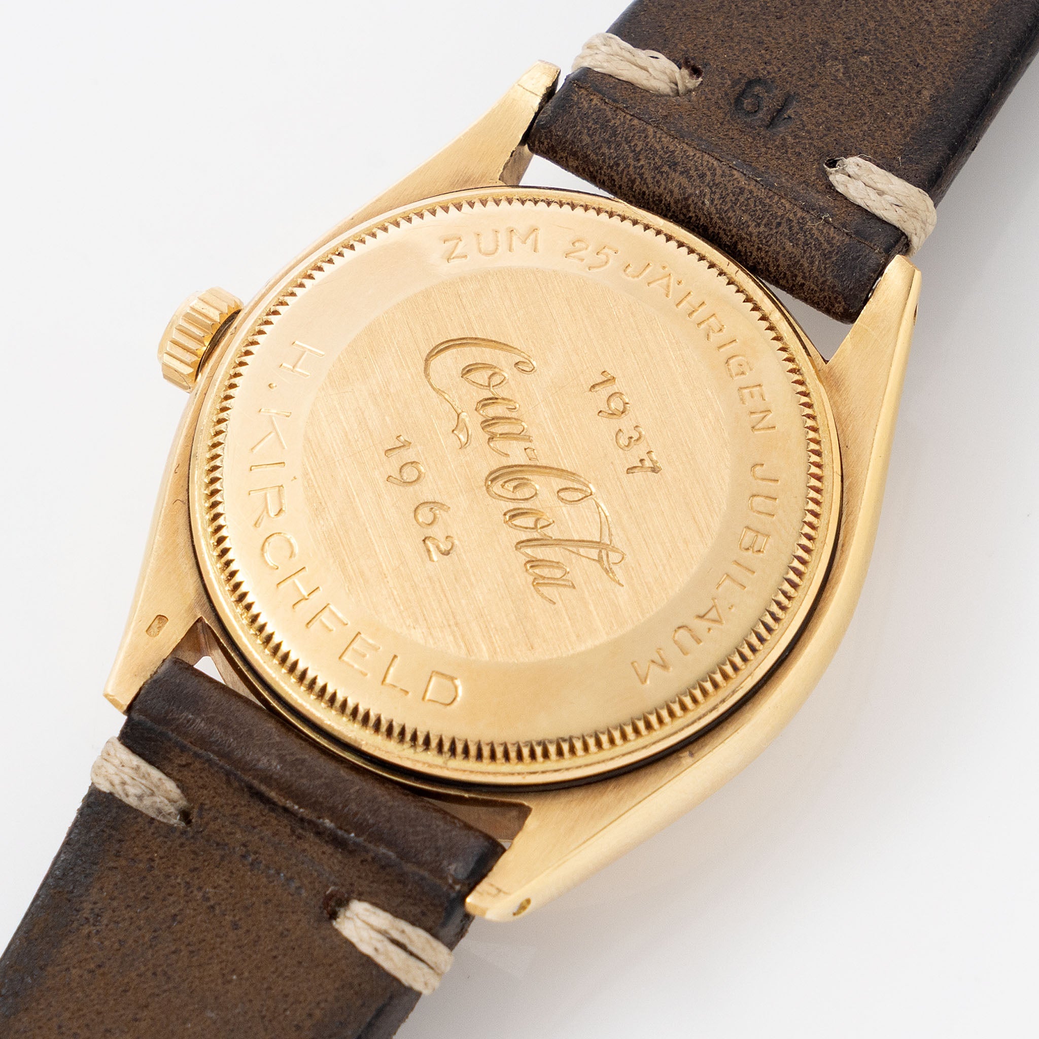 Rolex Oyster Perpetual 1002 Silver Soleil Swiss Only Dial in 18 k yellow gold Coca Cola