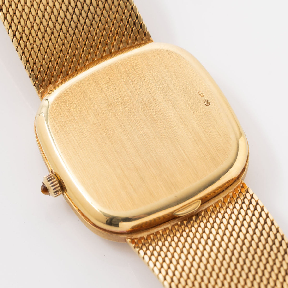 
Omega "State of Qatar" Squared Dresswatch Oxblood Stella-esque Dial from Original Owner Family in 18k yellow Gold with integrated Woven Bracelet 
