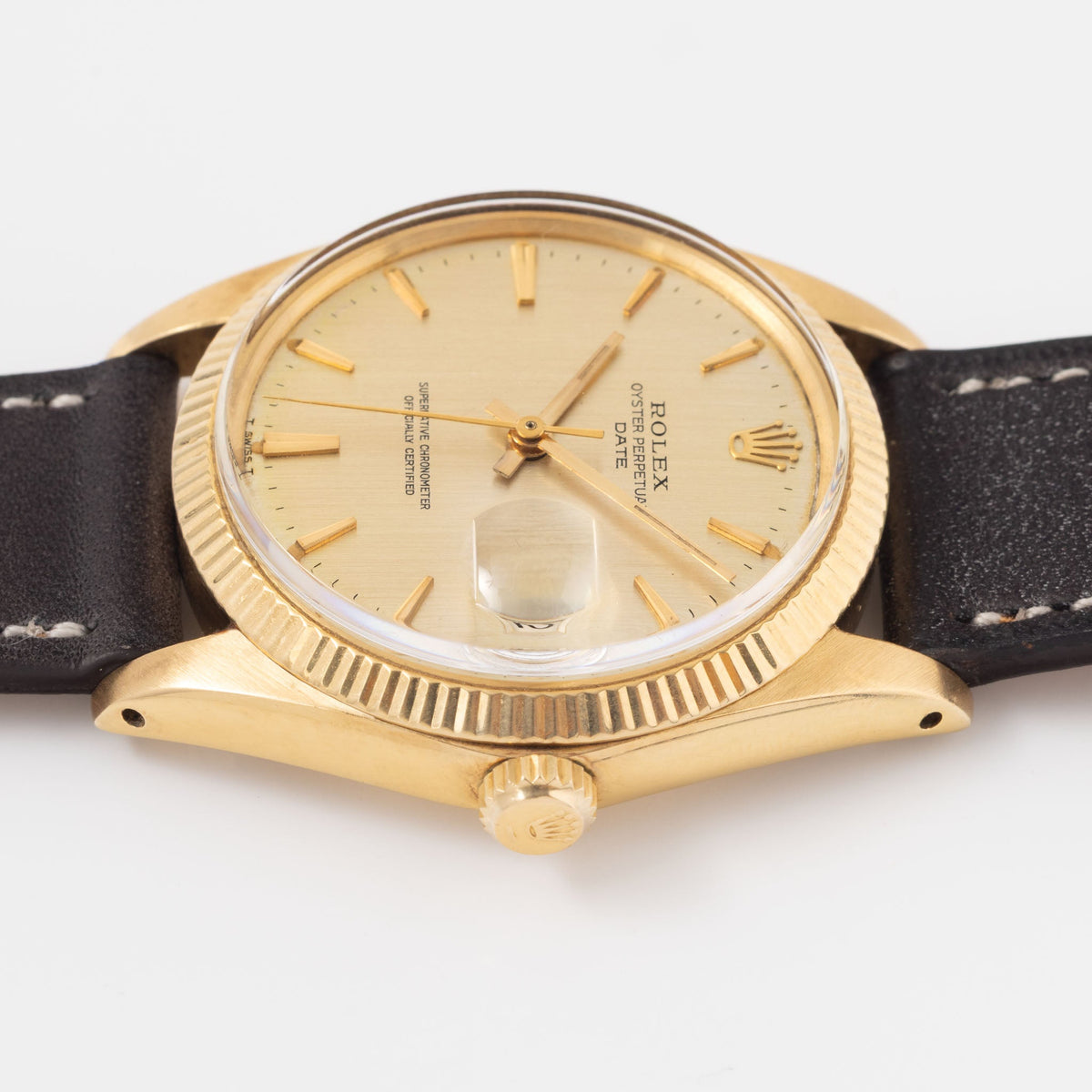 Rolex Oyster Perpetual Date 1503 in 18k Yellow Gold Vertical Brushed Champagne Dial