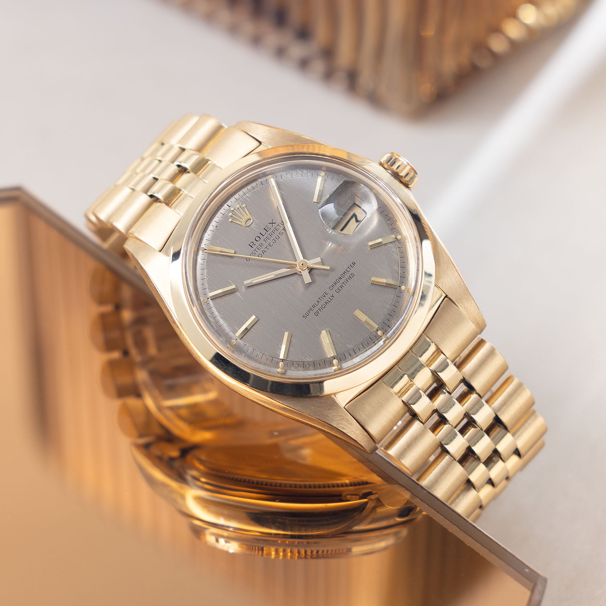 Rolex Datejust Grey vertical brushed dial in 18 k yellow gold ref 1600