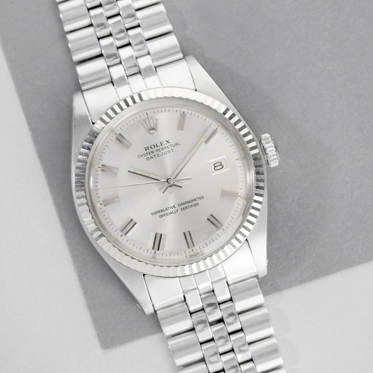 Bulang & Sons listing: steel Datejust 1601 with silver "Wide Boy" dial, broad applied batons and wide non-luminous hands. · Photo: Bulang & Sons · © Bulang & Sons, used with permission · Source: https://bulangandsons.fr/en/products/rolex-datejust-reference-1601-wideboy-dial